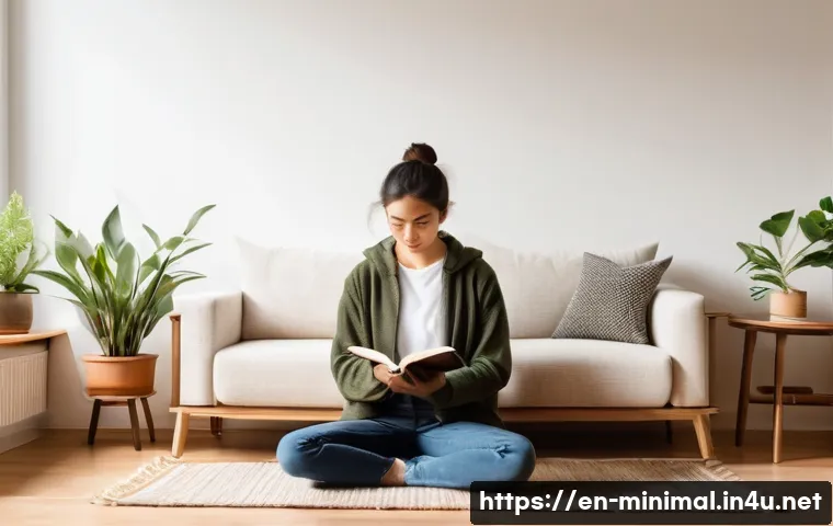 미니멀라이프 무소유 - A cozy, minimalist living room bathed in soft natural light, featuring a simple wooden bookshelf wit...